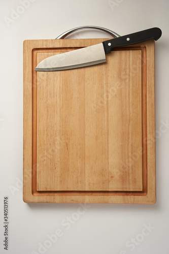 chopping board with kitchen knife