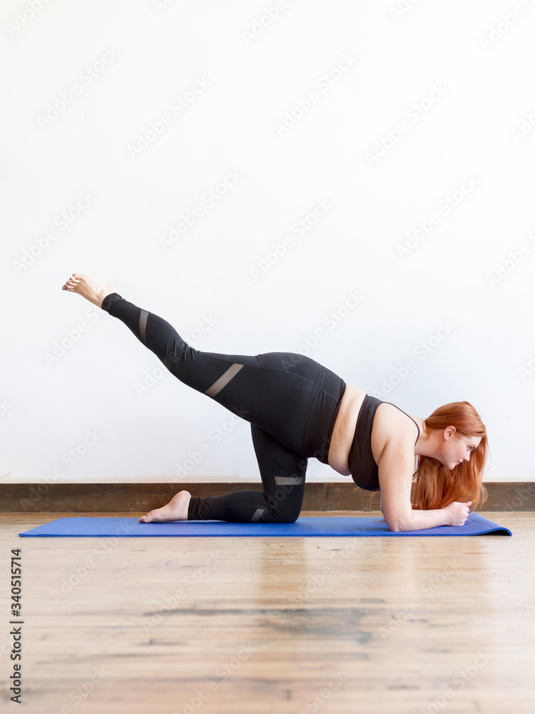Fototapeta premium Woman practicing yoga