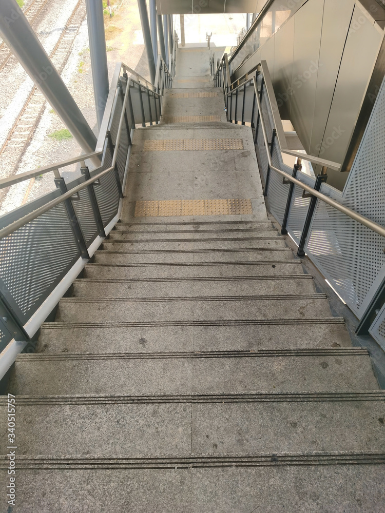 Fototapeta premium Architecture construction of elevator, escalator stairs and sky walk way, walk bridge between sky train station and department store mall
