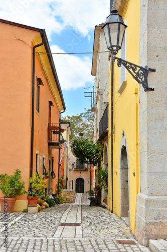 A small road between the old houses of Buonalbergo, a village in the province of Benevento photo