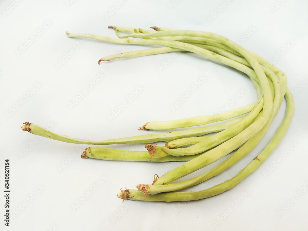Pale green yardlong bean in isolated white background. Pale green yardlong bean in isolated white background.