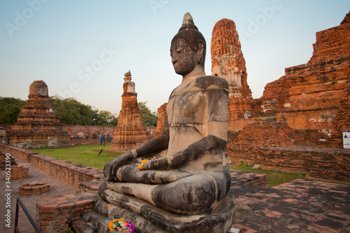 Buddha statue among Buddhist temples Thailand 