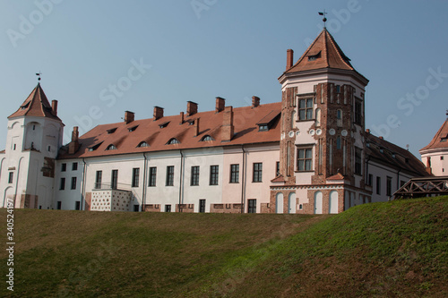 tower of red brick castle in Belarus