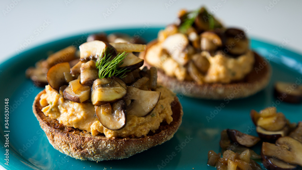 Vegan toast with hummus and mushrooms Vegan toast with hummus and mushrooms