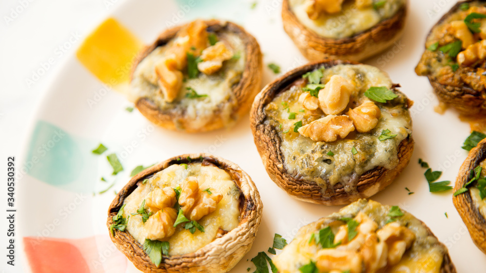 Stuffed mushrooms with blue cheese and walnuts
