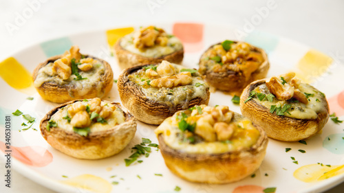 Stuffed mushrooms with blue cheese and walnuts