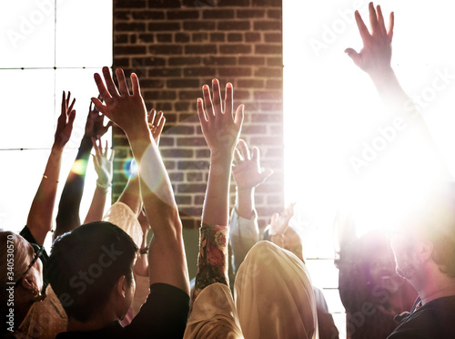 Photography Group of people with their hands raised