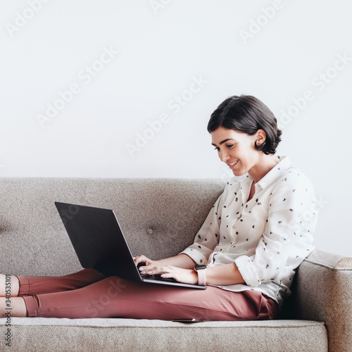 Принти на полотні Woman using a laptop