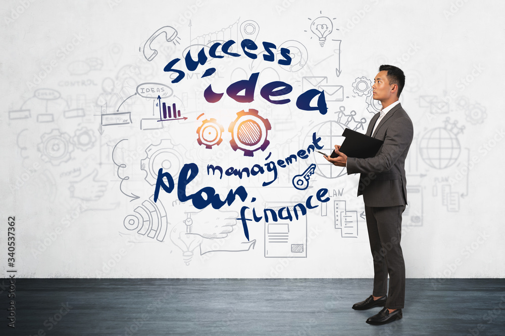 Businessman with clipboard and his business idea Businessman with clipboard and his business idea