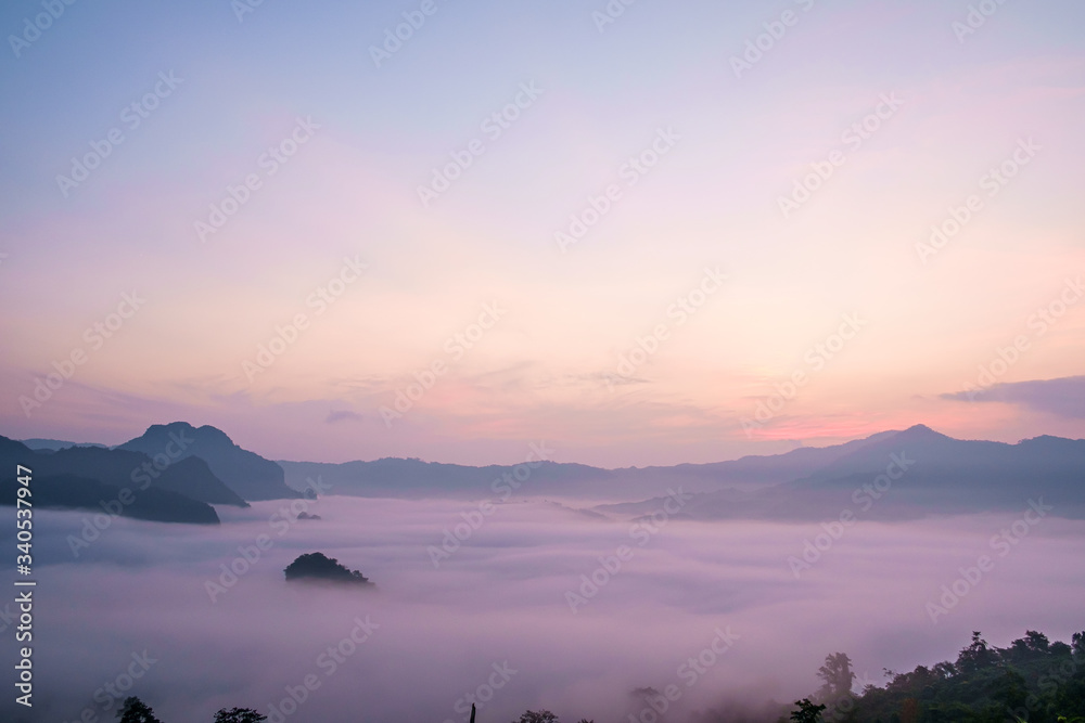 Fototapeta premium Traveling to see the sea of mist and sunrise in the morning at the view of Phu Lanka, Phayao Province, Thailand