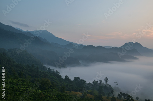 Fototapeta Naklejka Na Ścianę i Meble -  Traveling to see the sea of mist and sunrise in the morning at the view of Phu Lanka, Phayao Province, Thailand