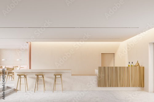 Beige bar interior with counter and sofa photo