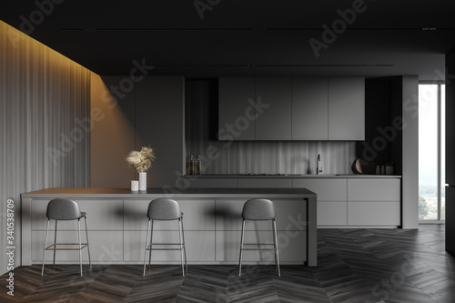 Gray and wooden kitchen interior with bar © ImageFlow