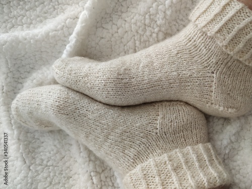 handknitted women's socks. winter evenings