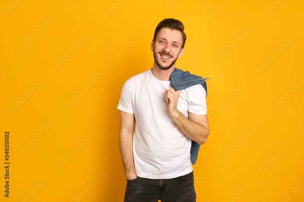 Happy hipster in white t-shirt is smiling Happy hipster in white t-shirt is smiling