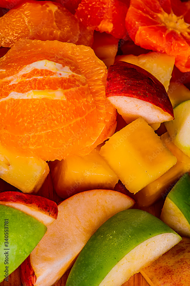 Many fruits are placed in a wooden tray. Many fruits are placed in a wooden tray.