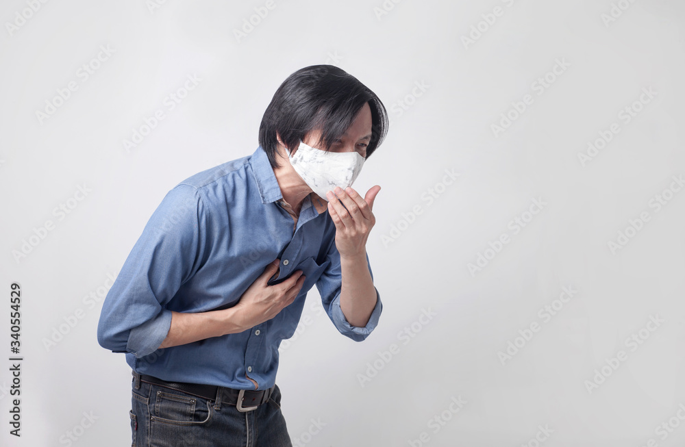 Men wearing masks are coughing but the virus is prevented by virus masks from spreading Men wearing masks are coughing but the virus is prevented by virus masks from spreading