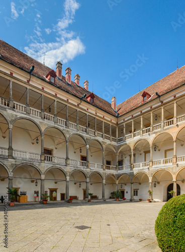 The courtyard of the Opocno castle with three floors of arcaded balconies.