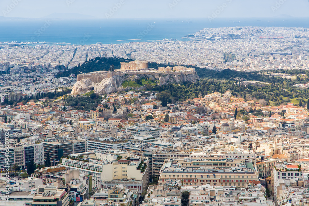 cityscape of Athens in day time with the Acropolis seen from Lycabettus Hill, the highest point in the city