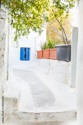 Fototapeta Naklejka Na Ścianę i Meble -  Architectural details from the narrow streets of Anafiotika, a traditional village in Athens, the Greek capital. Old neighborhood on the slopes of Acropolis, Greece