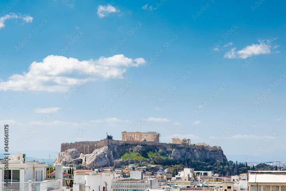 Athens cityscape, Greece. Acropolis with famous Parthenon. Urban landscape of old Athens with classical Greek ruins. 
