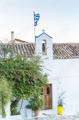 Fototapeta Naklejka Na Ścianę i Meble -  Architectural details from the narrow streets of Anafiotika, a traditional village in Athens, the Greek capital. Old neighborhood on the slopes of Acropolis, Greece