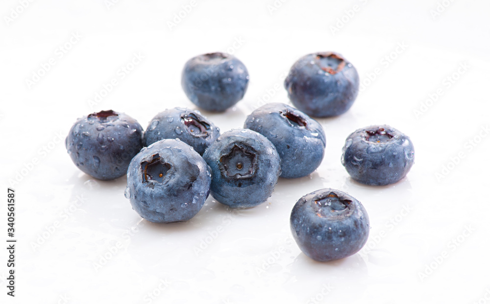 Group wet blueberries on white background. Isolated Group wet blueberries on white background. Isolated