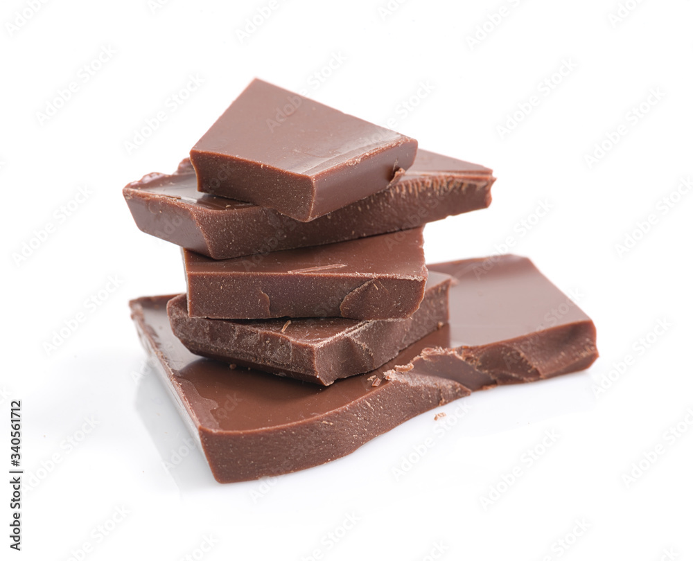bath of chocolate pieces on white background. Isolated bath of chocolate pieces on white background. Isolated