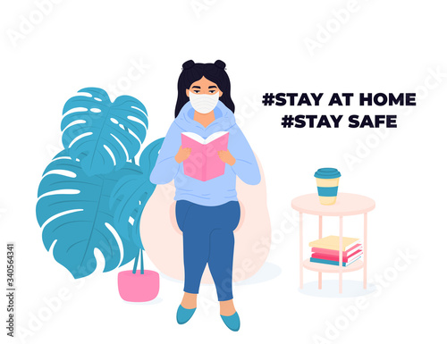 Learning at home. Schoolgirl is reading a book. Quarantine during a coronavirus COVID-19. Self isolation