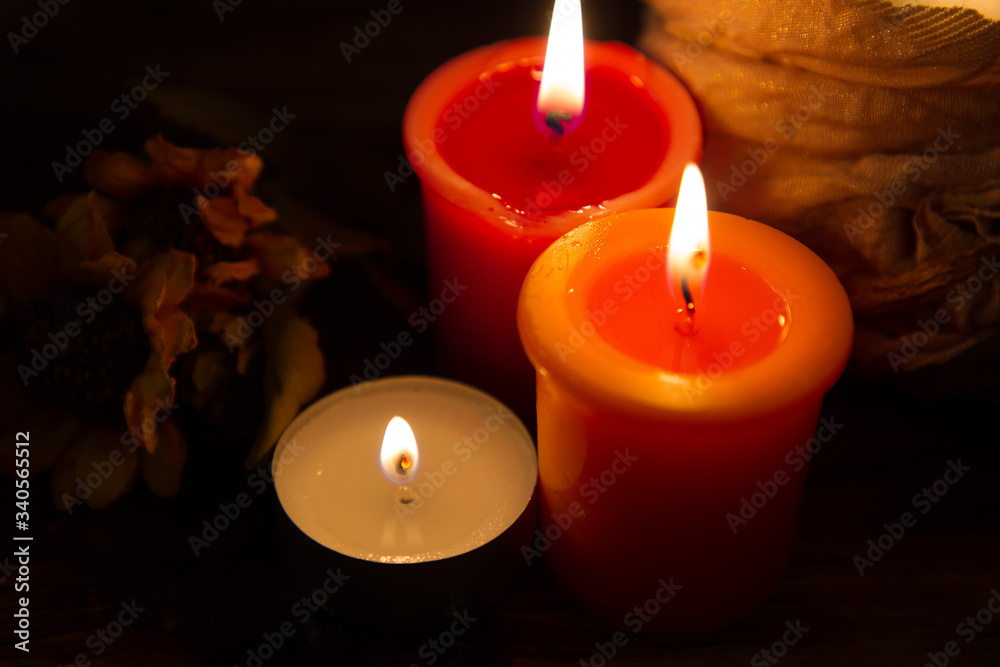 red candles on a dark background red candles on a dark background
