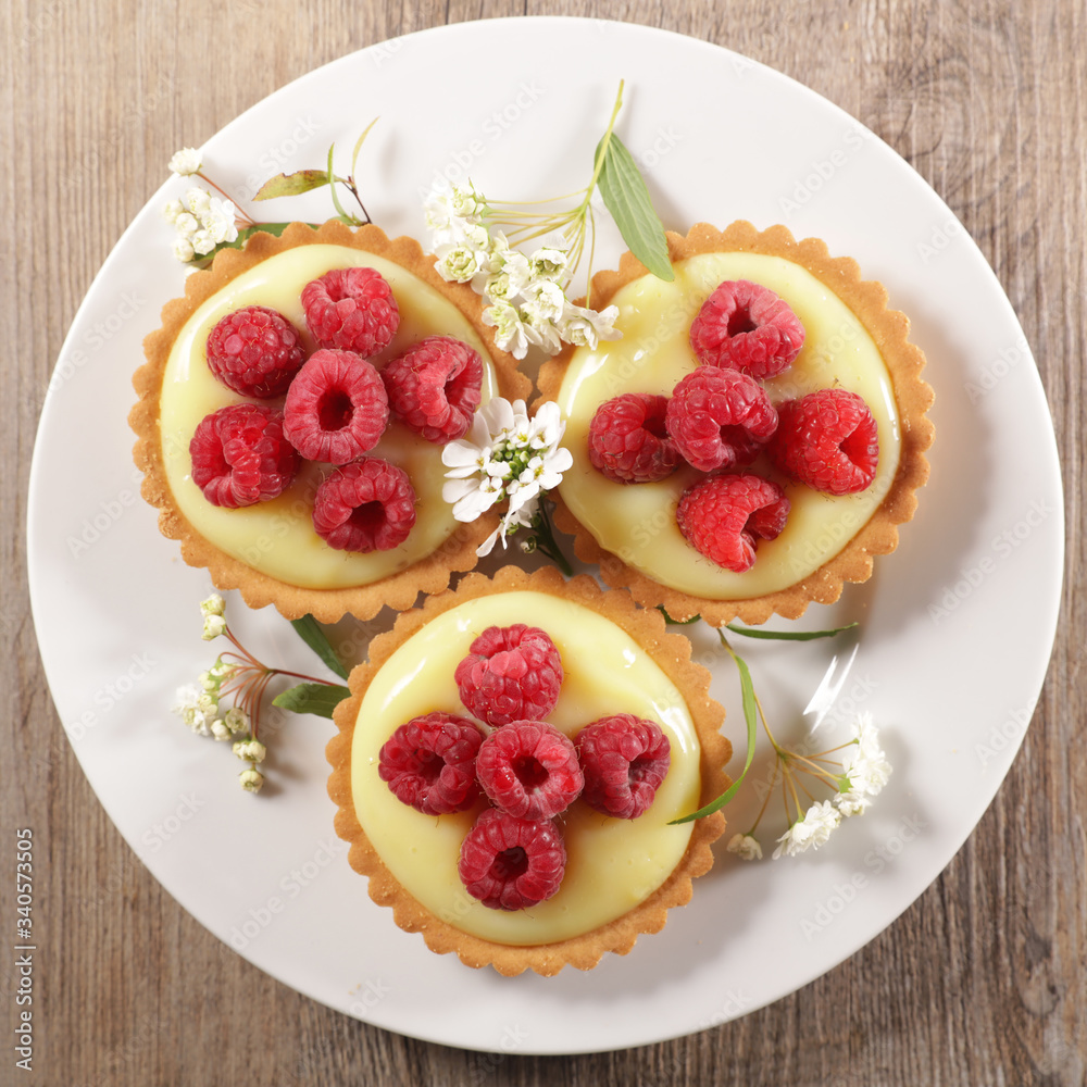 delicious raspberry tart with cream- top view
