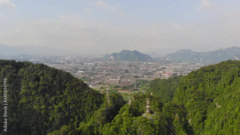 Misty mountain and city view from cave temple top view- Slide Right Misty mountain and city view from cave temple top view- Slide Right