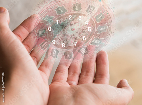 White numbers fly out of  hands, numerology
