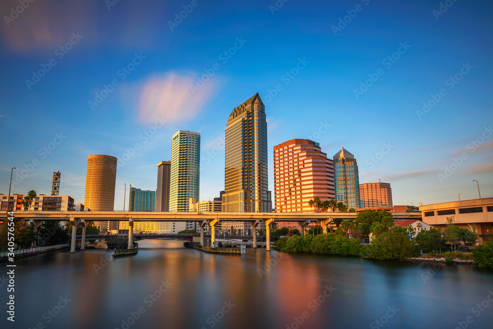 Tampa skyline at sunset with Hillsborough river in the foreground
