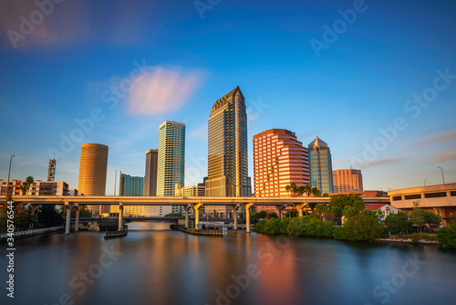 Tampa skyline at sunset with Hillsborough river in the foreground