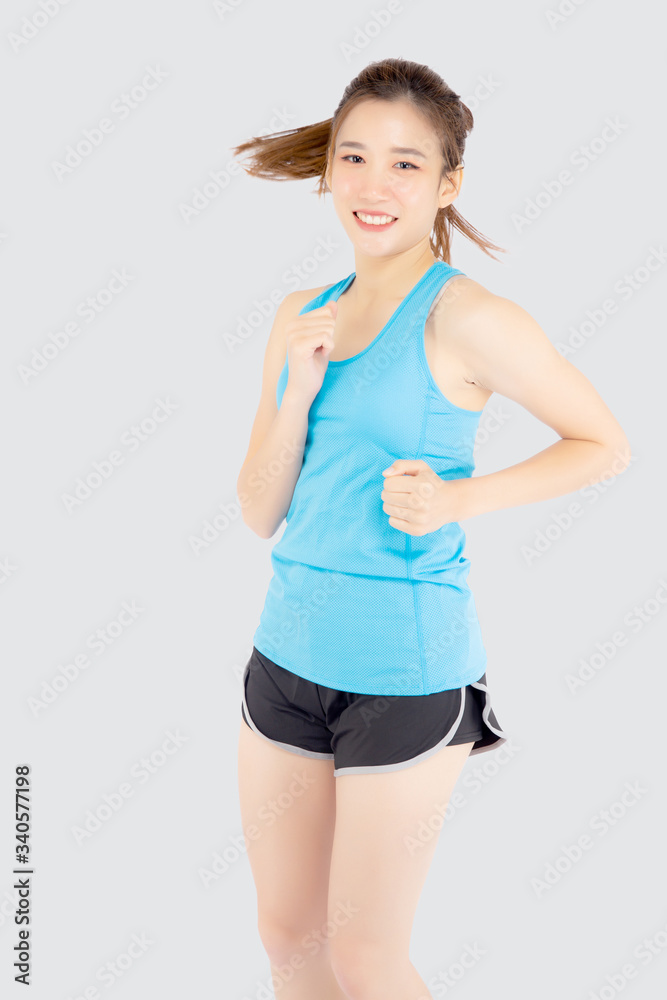 Beautiful young asian woman happy and smiling jogging isolated on white background, asia girl cheerful in sport is activity exercise cardio and workout with running for healthy, health concept. Beautiful young asian woman happy and smiling jogging isolated on white background, asia girl cheerful in sport is activity exercise cardio and workout with running for healthy, health concept.