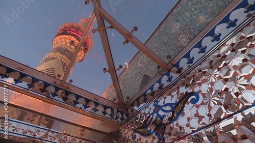 Karbala, Iraq. View of the golden towers, domes of the mosque. The shrine of Imam Abbas in Karbala, Iraq photo