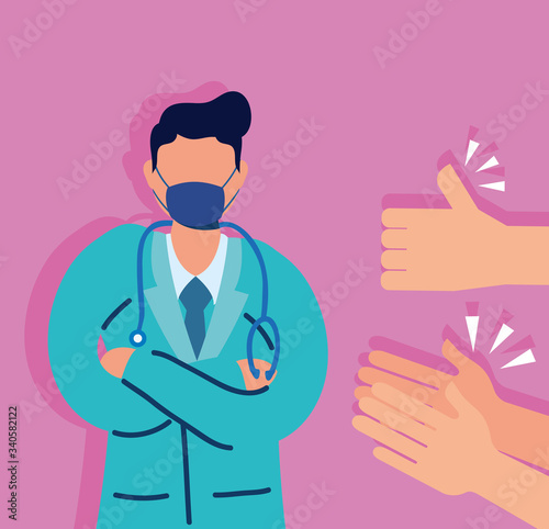 doctor with face mask and hands clapping