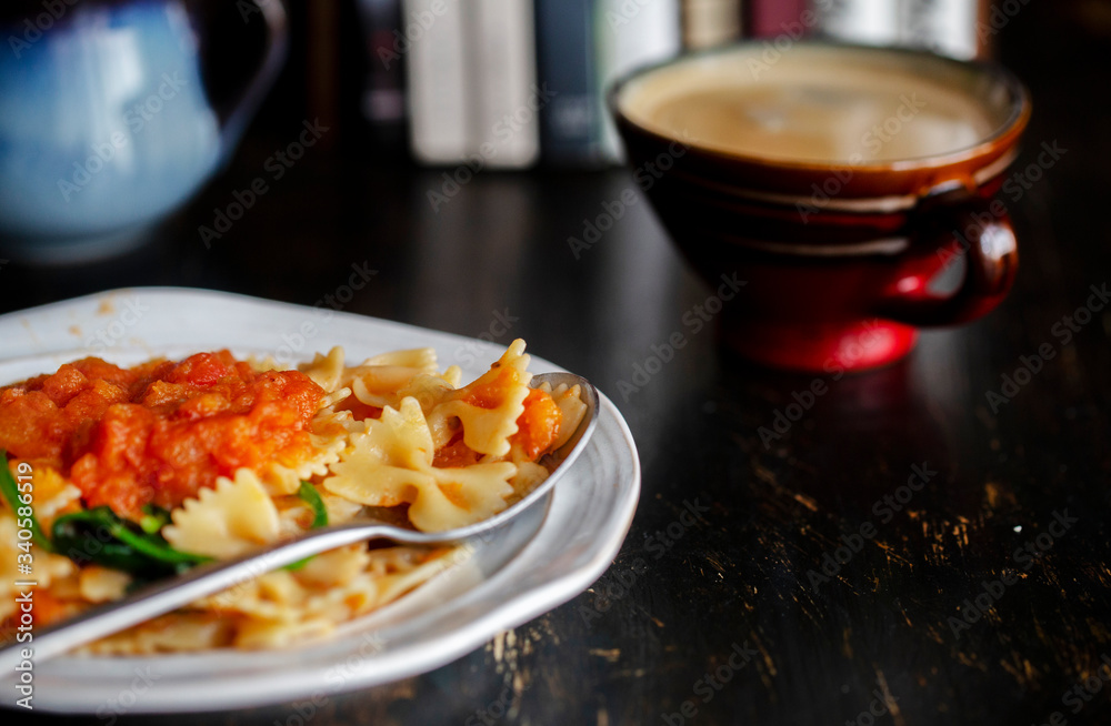 Homemade farfalle, with spinach and tomato sauce Homemade farfalle, with spinach and tomato sauce