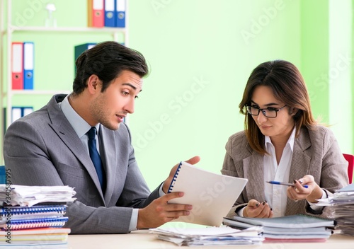 Two colleagues working in the office