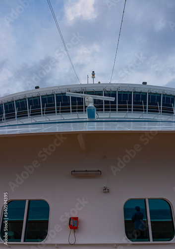 Large white cruise ship in the port of Savona, Italy