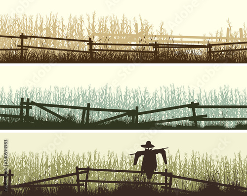 Fotomurale Set of horizontal banners silhouettes of cornfield and grass in front of it with a wooden fence