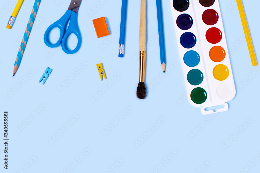 School supplies on blue background. Back to school flat lay picture. School supplies on blue background. Back to school flat lay picture.