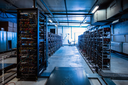 Bitcoin and crypto mining farm. Big data center. photo