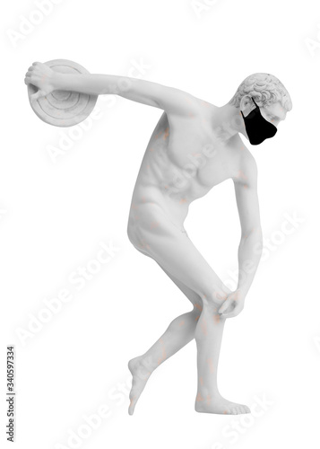 Athlete in a protective mask. Virus protection. Discus thrower an ancient Greek marble statue in a black mask. A concept of a world pandemic.
