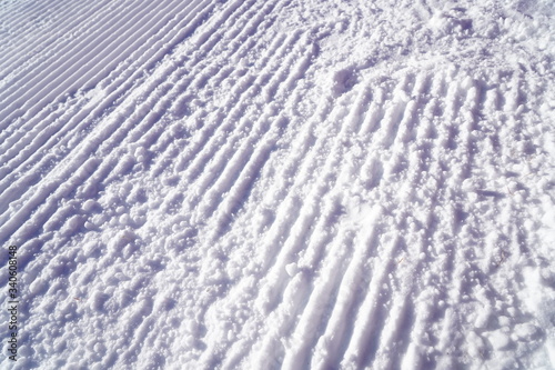 High angle view of snow texture  background with copy space. background of fresh snow texture