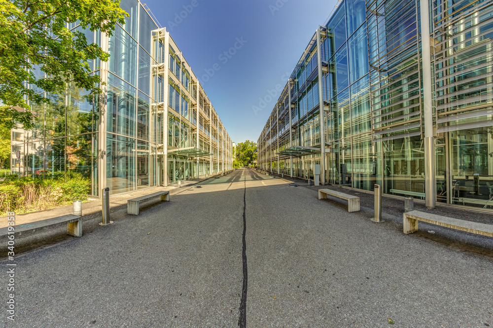 Bern, Switzerland - July 30, 2019: A modern metal concrete and glass mounted building in the Swiss Capital. Panoramic. View at sunny summer day
