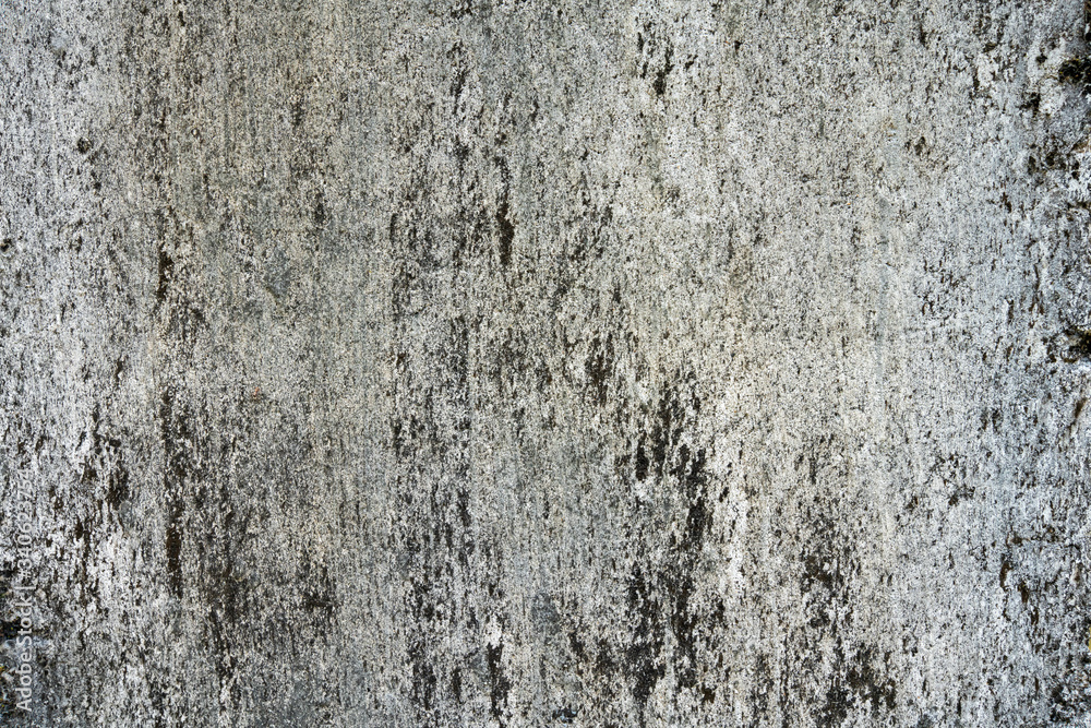 grey old concrete background. The old wall was streaked and scratched. Old lime rotting on the walls grey old concrete background. The old wall was streaked and scratched. Old lime rotting on the walls