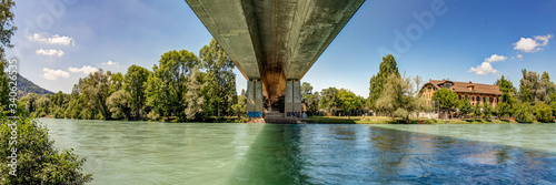 Bern, Switzerland - July 30, 2019: Aar under the Monbijoubrucke Bridge. Concrete brige over the Aare river. Bern Switzerland. Super wide angle panorama