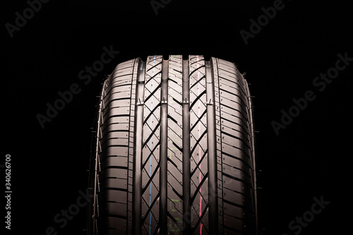 new summer tire for SUVs and crossovers close-up on a black background